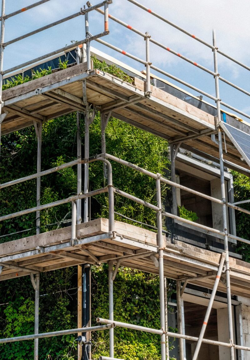 building-with-solar-panels-scaffolding (1)